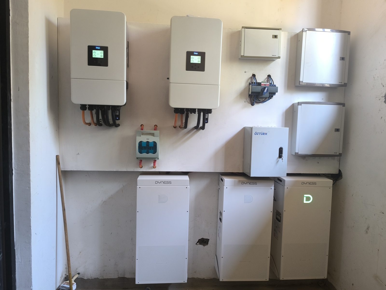 Hybrid solar system installed by Rand Energies: two Deye hybrid inverters, Dyness battery storage and protection boards